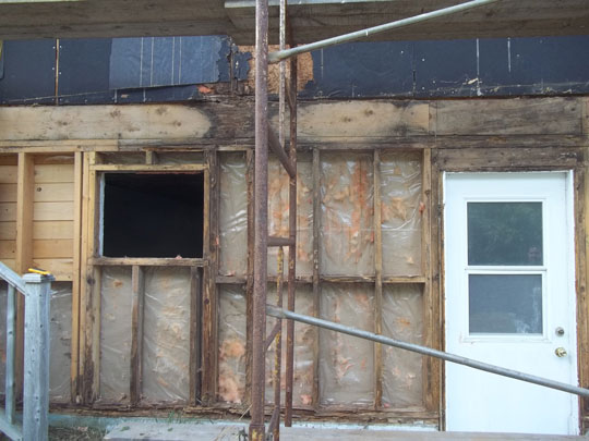 Closeup of water damage and frame deterioration
