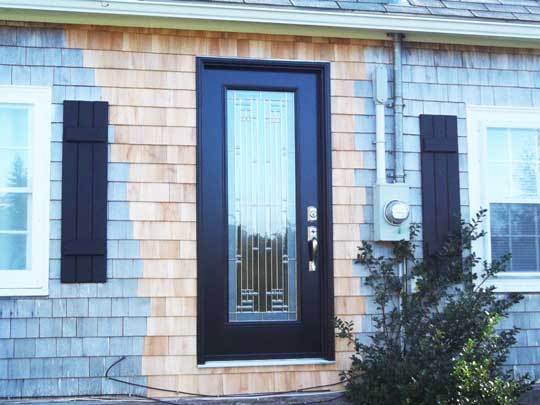 New entrance door installed in existing home adds security and reduces heat loss.